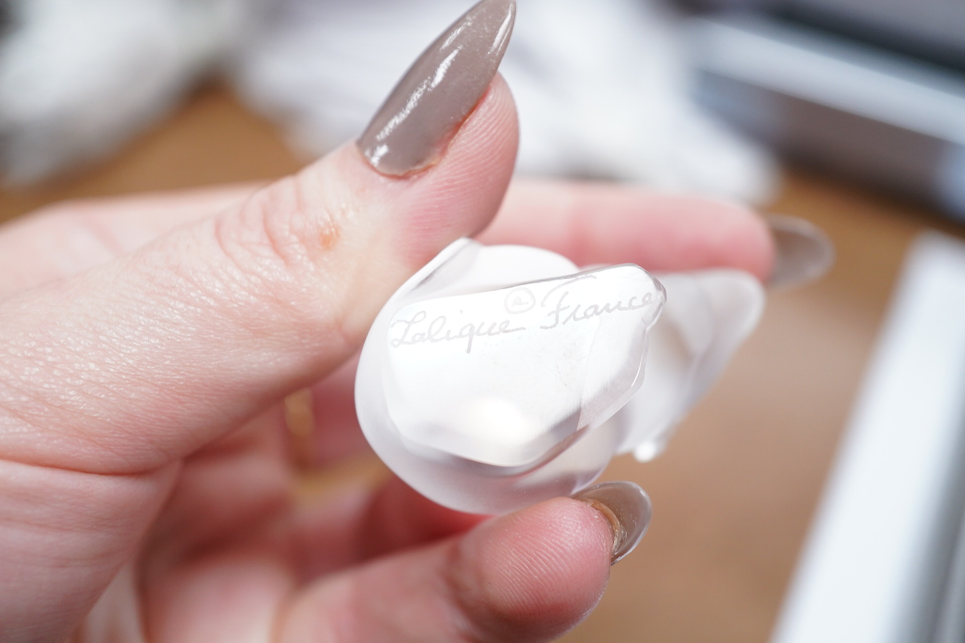 Three items of modern Lalique glass comprising paperweight in the form of a heart, shell dish and mouse, two boxed, largest 12.5cm. Condition - good